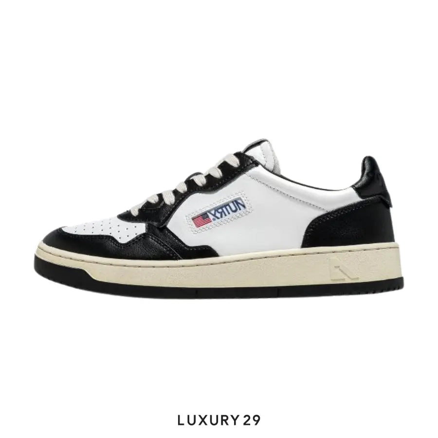 AUTRY SNEAKERS WOMAN MEDALIST LOW SNEAKERS IN TWO-TONE LEATHER COLOR WHITE AND BLACK(M) AUTRY