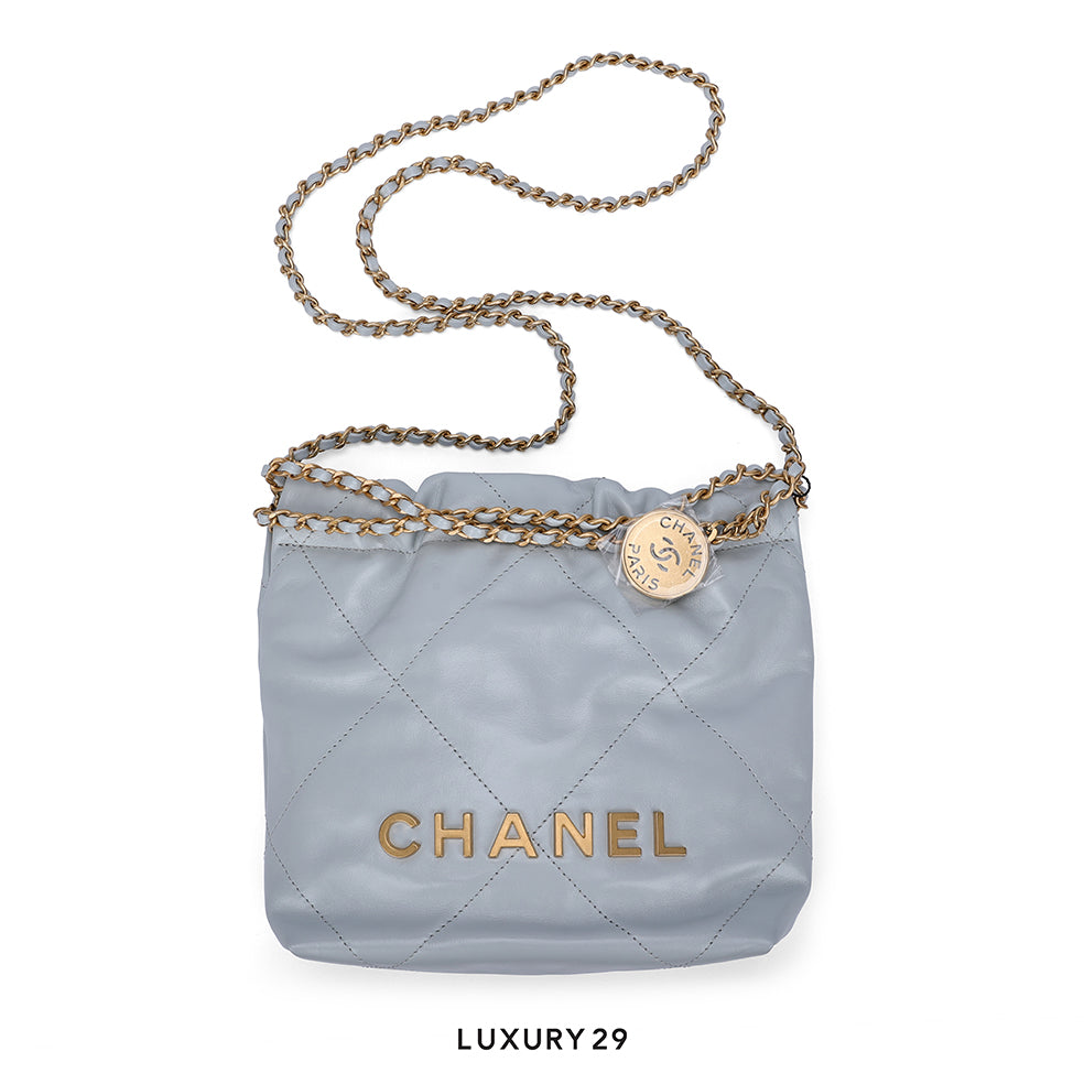Chanel 22 Mini Handbag Shiny Calfskin & Gold-Tone Light Blue CHANEL