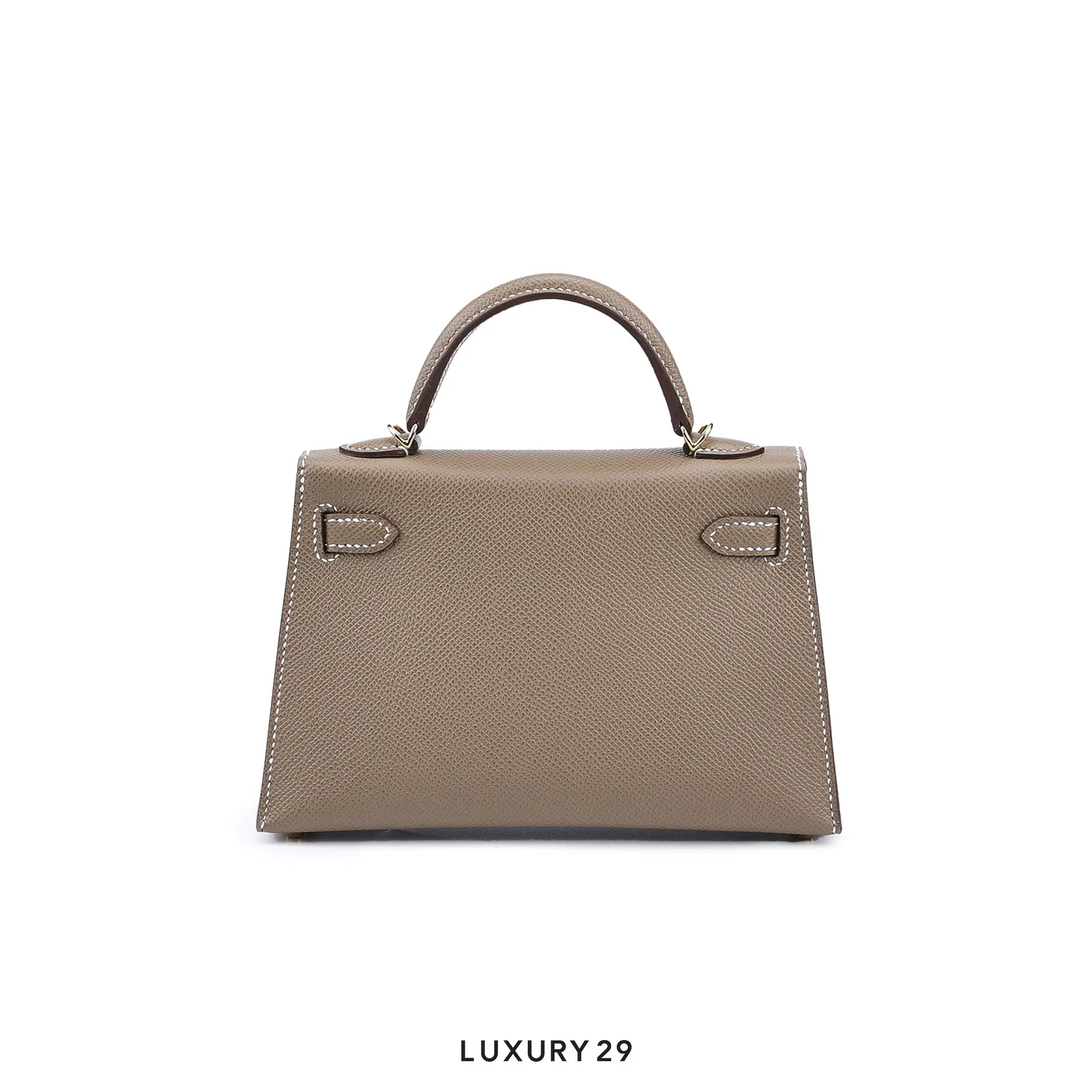 Beige handbag on a white background with 'Luxury 29' branding.