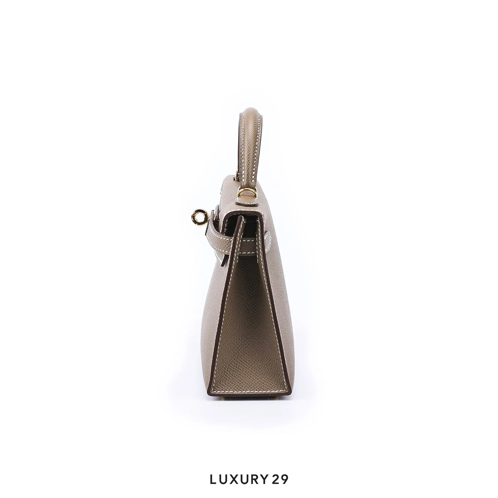 Gold handbag on a white background with 'LUXURY 29' branding.