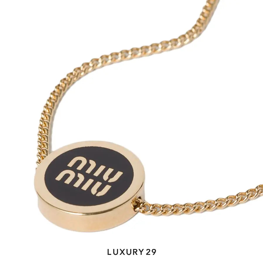 Miu Miu Enameled metal bracelet black MIU MIU
