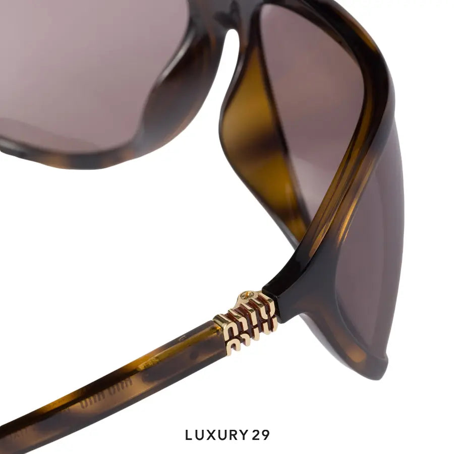 Miu Miu Enigme sunglasses Lenses Mauve MIU MIU
