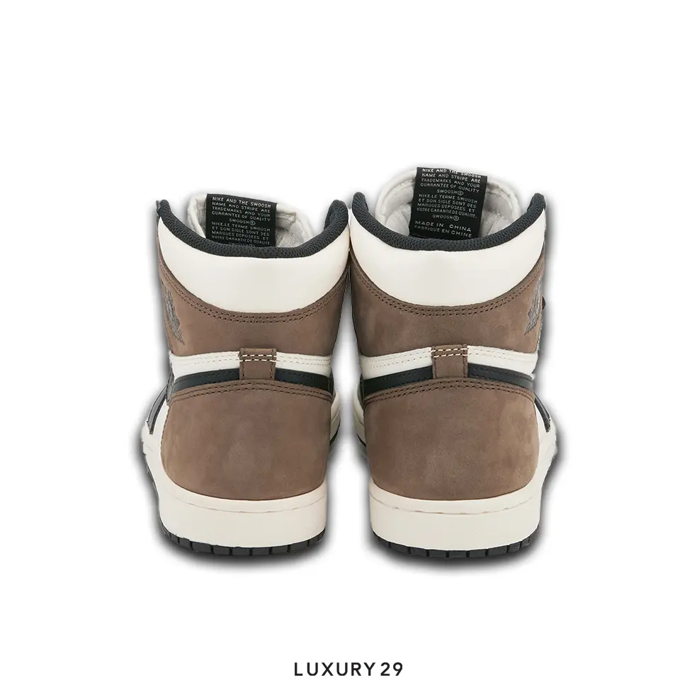 Brown high-top sneakers with white soles on a white background