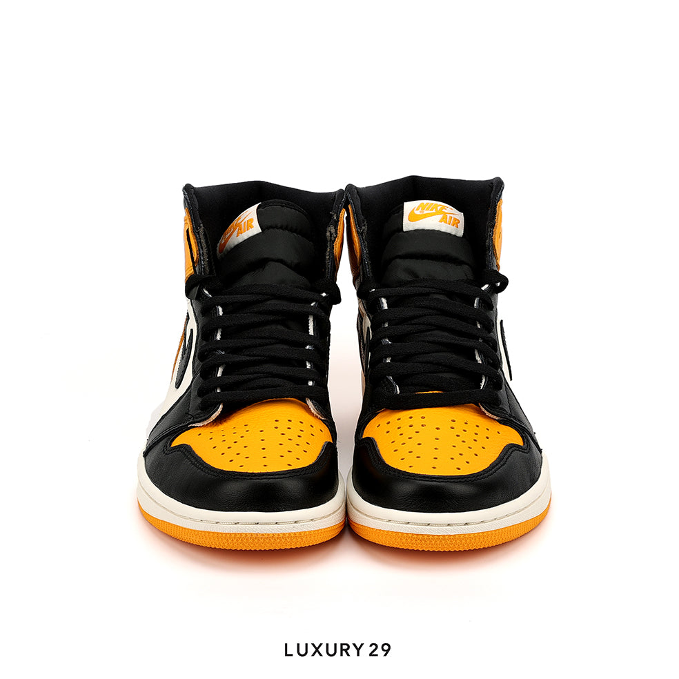 Black and yellow high-top sneakers on a white background with 'LUXURY 29' branding.