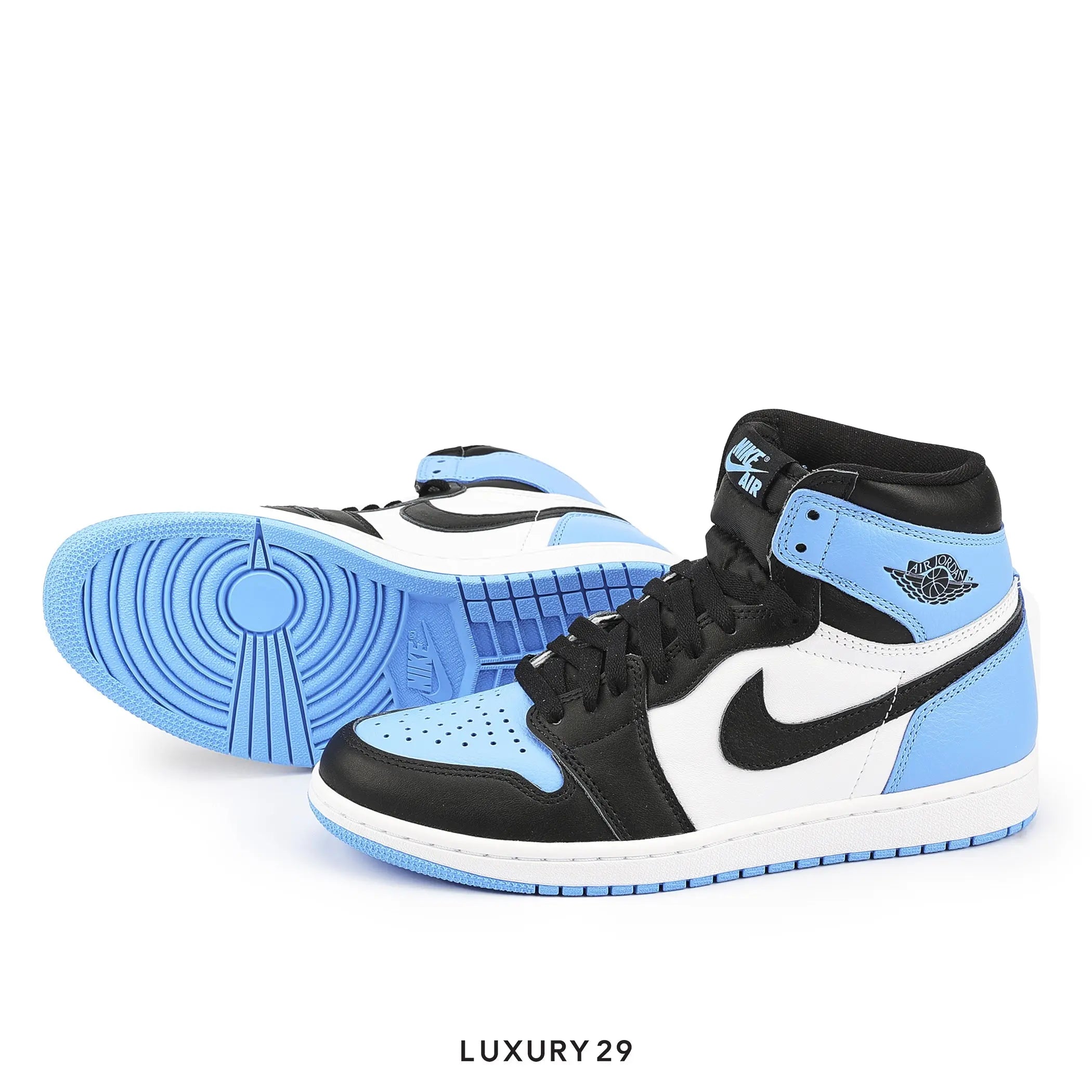 Black, white, and blue high-top sneakers on a white background with 'LUXURY 29' branding.