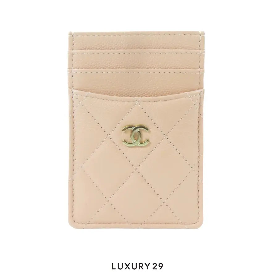 Chanel Classic Vertical Card Holder in light pink quilted caviar leather with gold-tone metal hardware