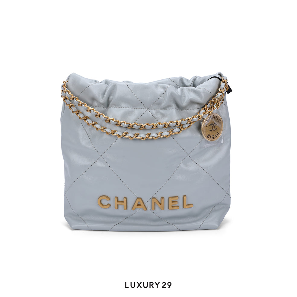 Chanel 22 Mini Handbag Shiny Calfskin & Gold-Tone Light Blue CHANEL