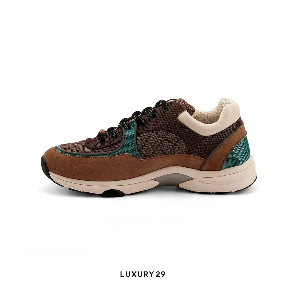 Brown and teal sneaker with 'LUXURY 29' label on a white background