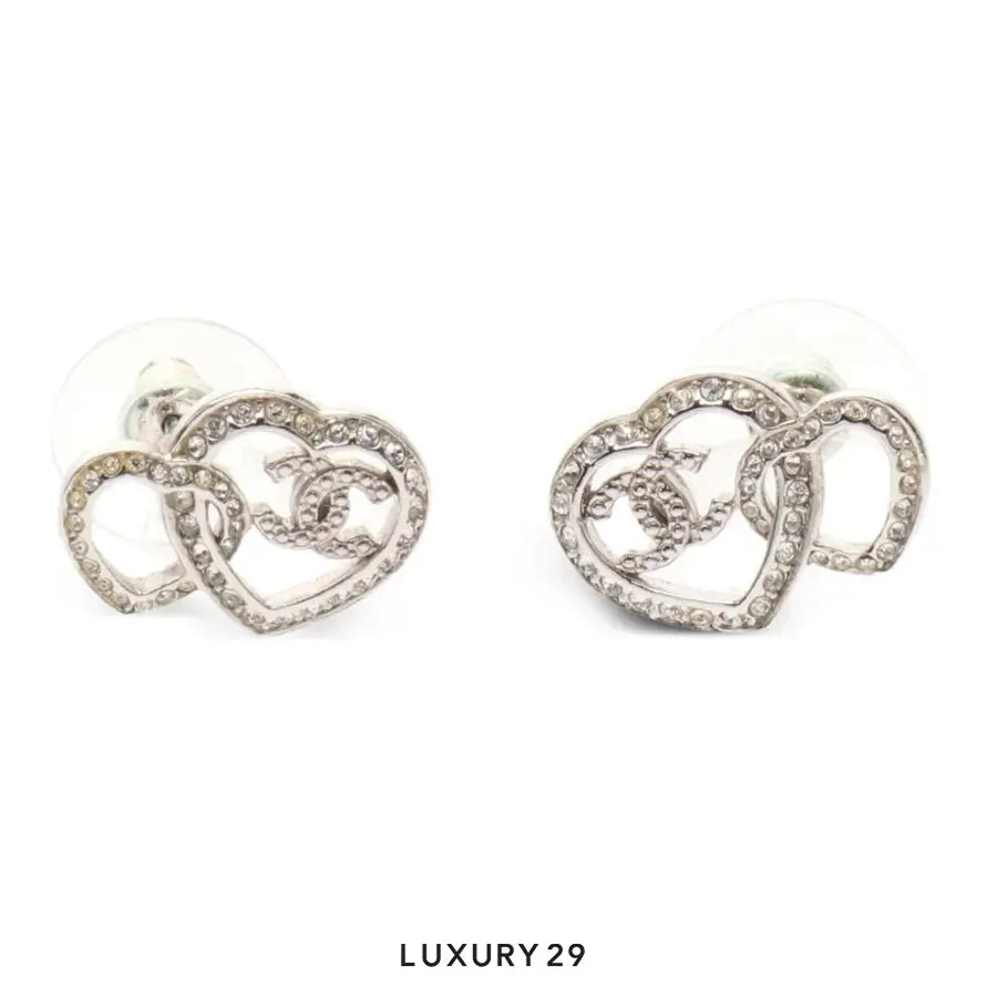 Chanel heart stud earrings with a crystal-encrusted