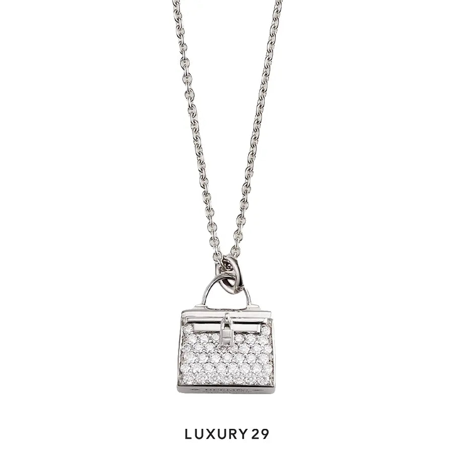 Hermes Amulettes Kelly pendant White gold
