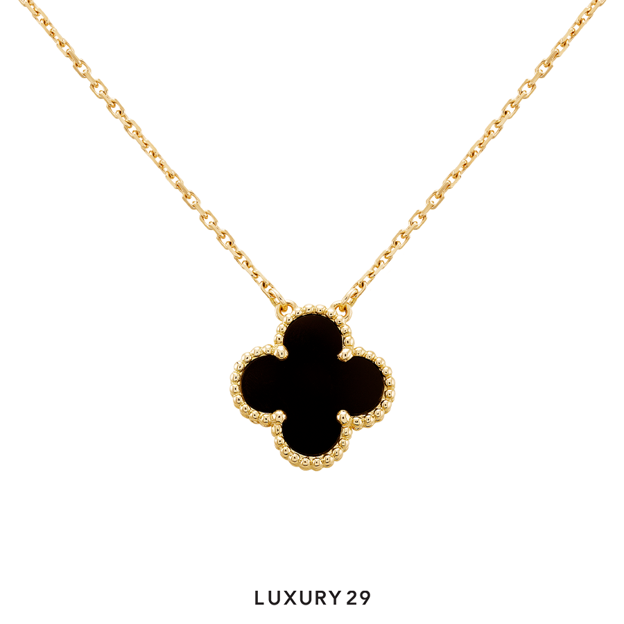 Van Cleef & Arpels Vintage Alhambra pendant, 18K yellow gold, onyx VAN CLEEF & ARPELS