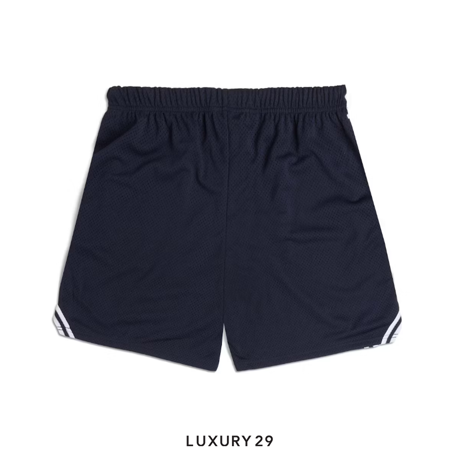 Navy blue shorts with white trim on a white background