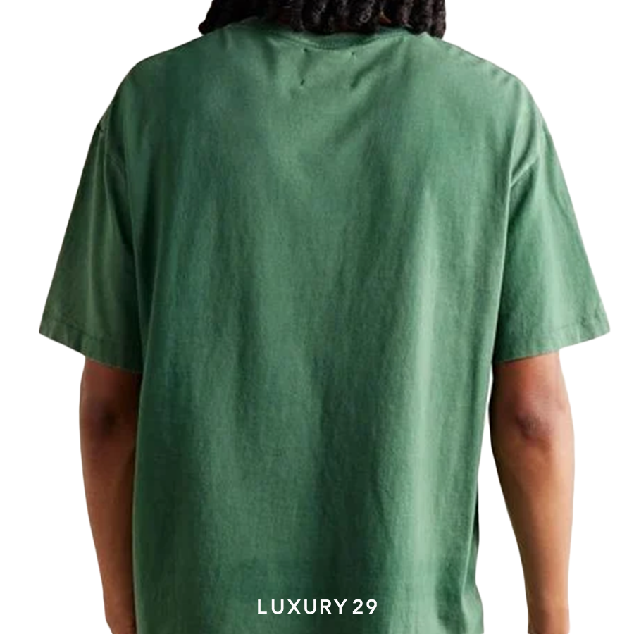 Green t-shirt worn by a person on a white background with 'LUXURY 29' branding.
