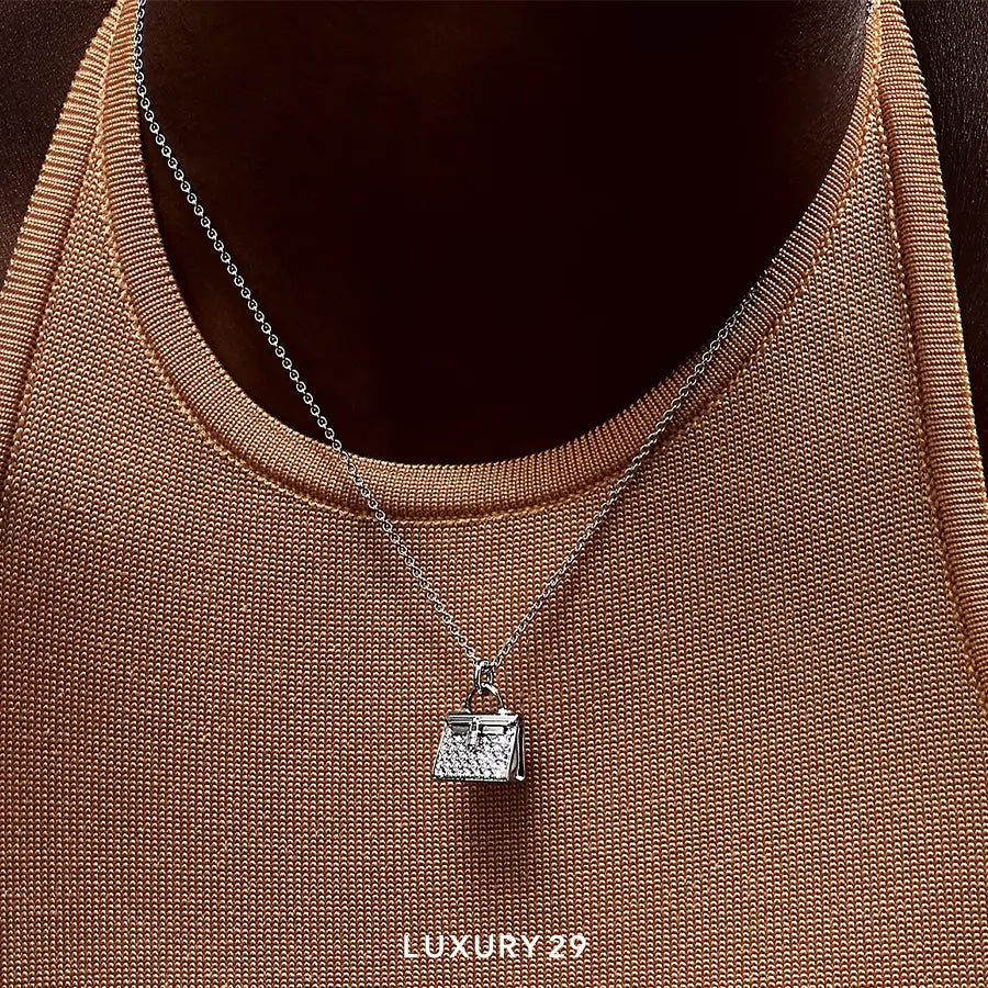 Hermes Amulettes Kelly pendant White gold HERMES