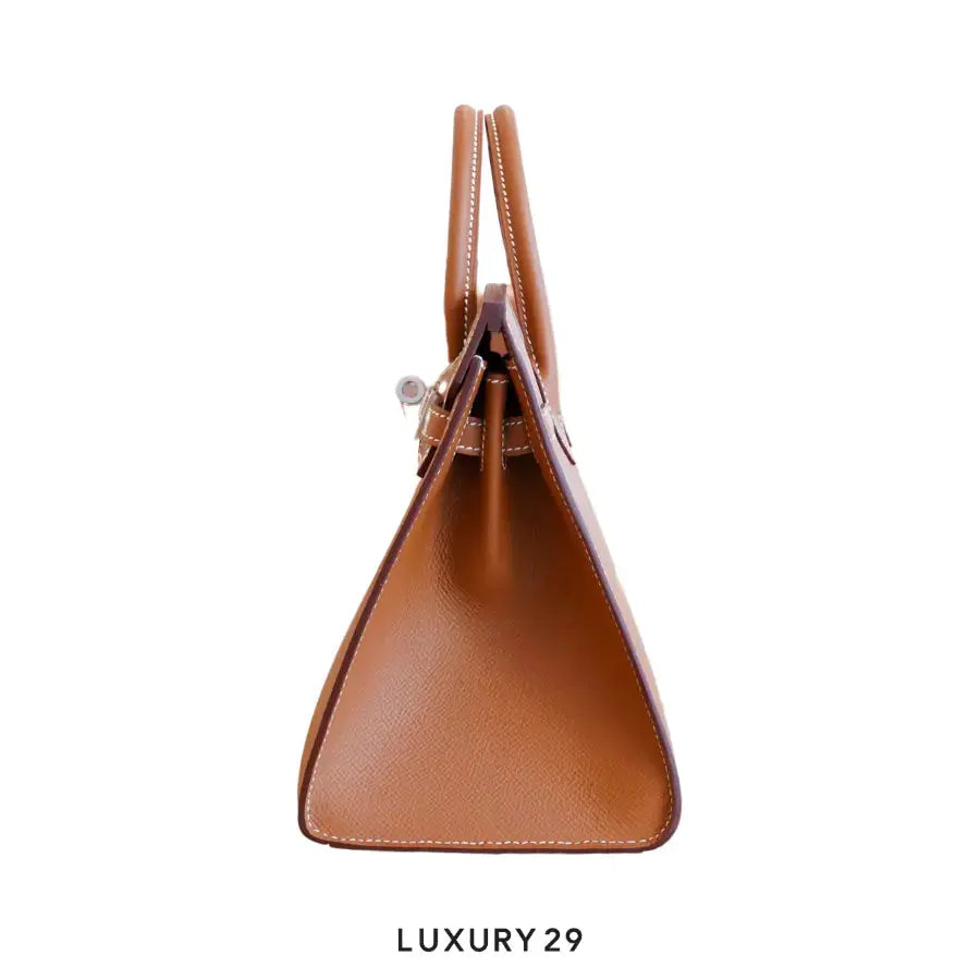 Brown handbag on a white background with 'LUXURY 29' text.