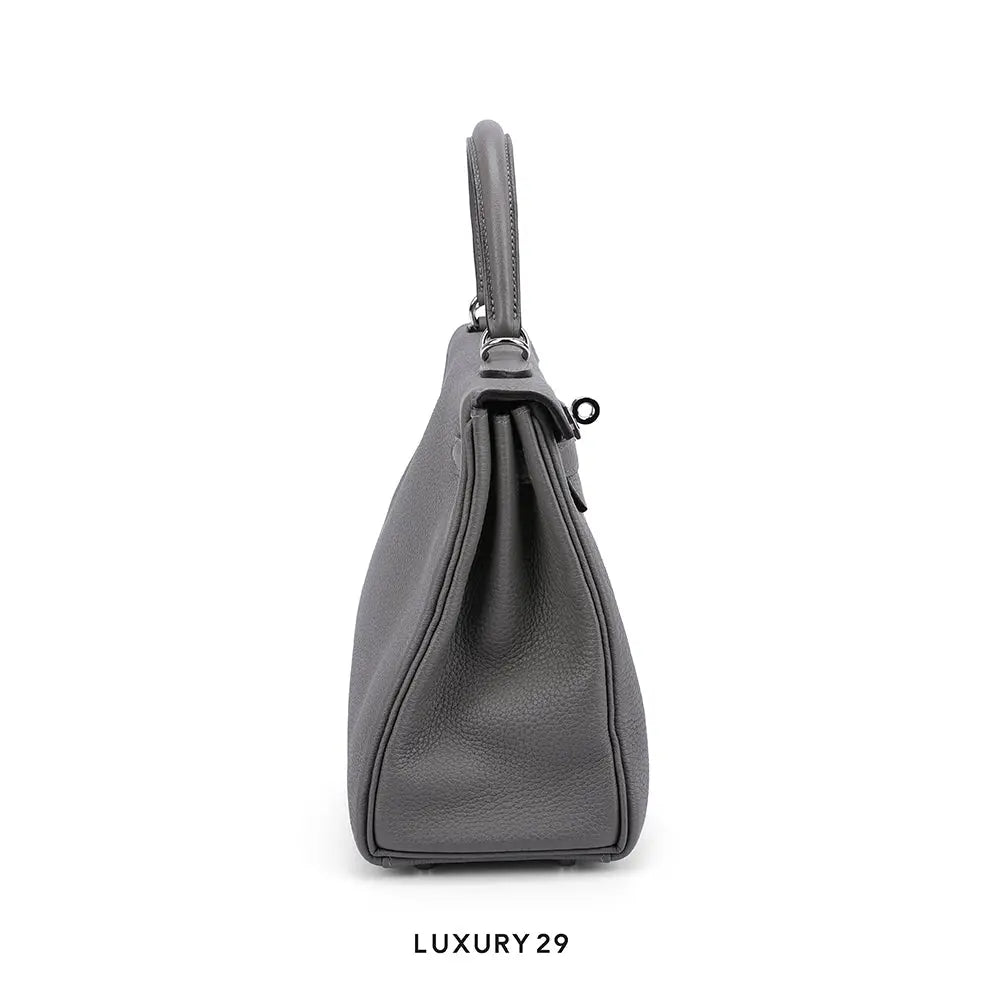 Gray handbag on a white background with 'LUXURY 29' text.