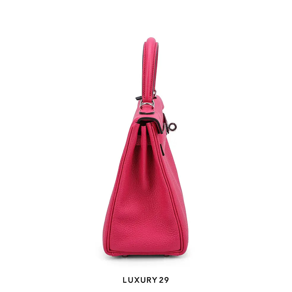 Pink handbag on a white background with 'LUXURY 29' text.