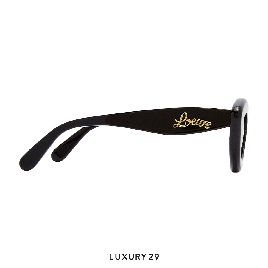 Black sunglasses with gold 'Loewe' logo on a white background
