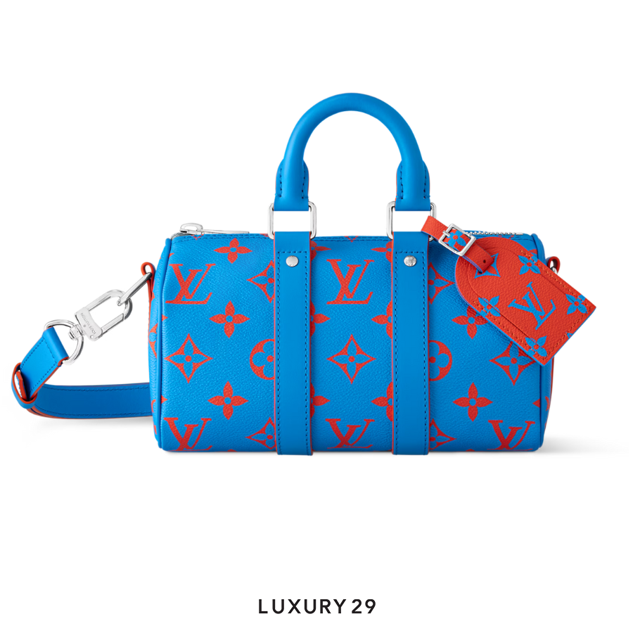 Louis Vuitton LV Keepall Bandouliere 25 Monogram Glow coated canvas Blue red LOUIS VUITTON