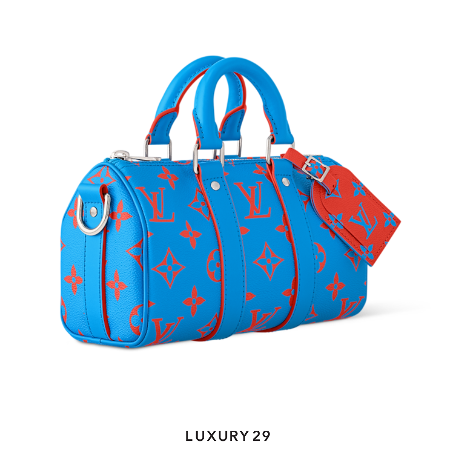 Louis Vuitton LV Keepall Bandouliere 25 Monogram Glow coated canvas Blue red LOUIS VUITTON