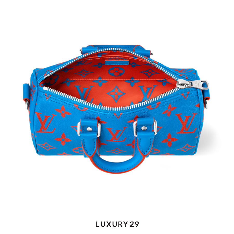 Louis Vuitton LV Keepall Bandouliere 25 Monogram Glow coated canvas Blue red LOUIS VUITTON
