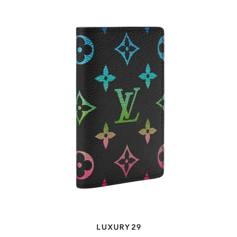 A Louis Vuitton LV Pocket Organizer with a black background featuring a multicolored geometric pattern and the LV monogram.