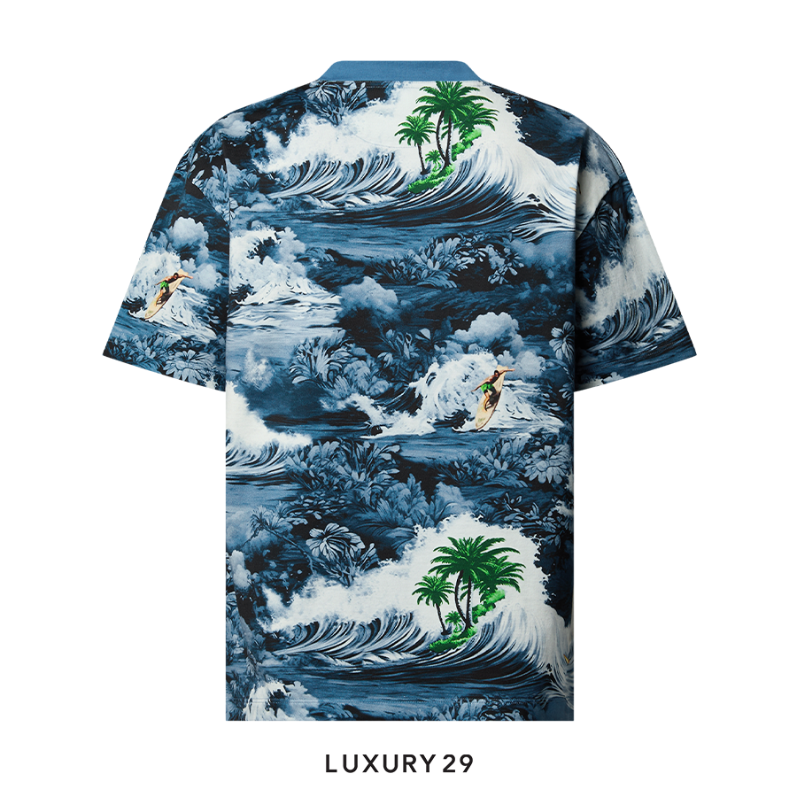 Hawaiian shirt with ocean and palm tree design on a white background