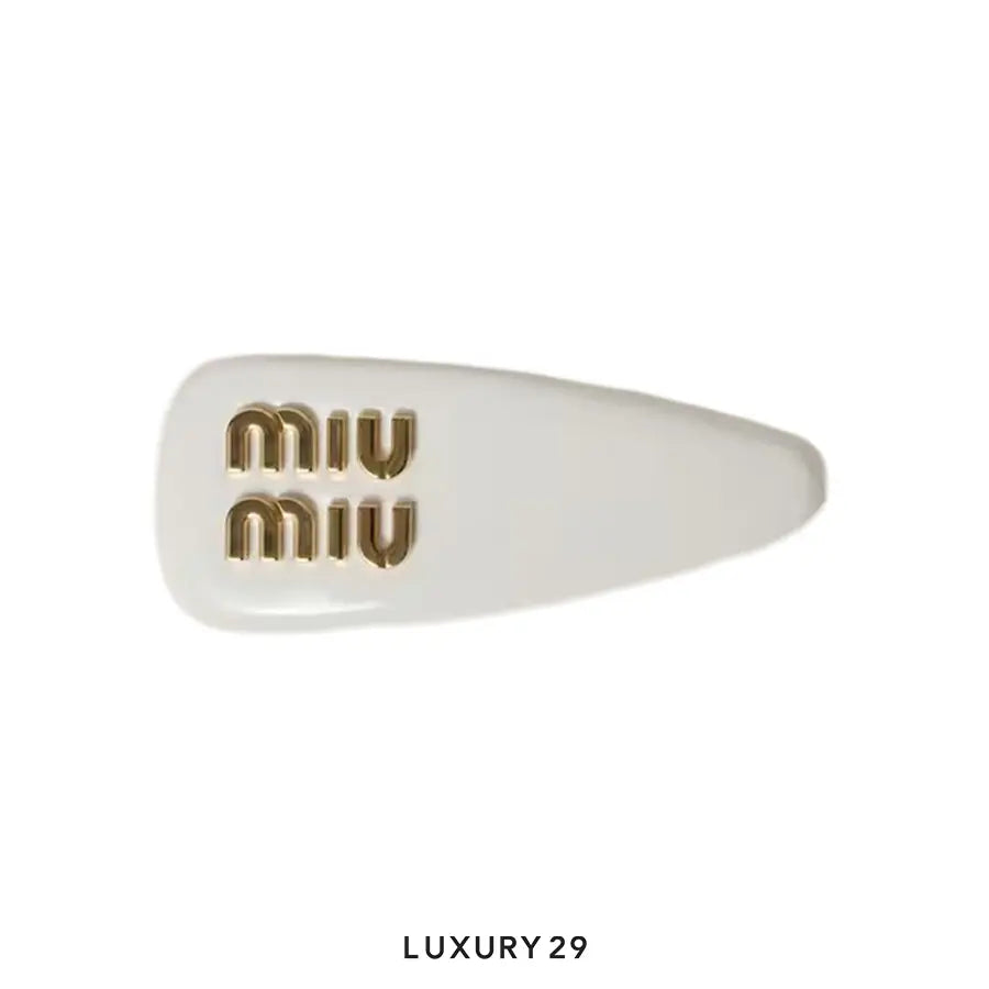 Miu Miu Patent leather hair clip Bianco