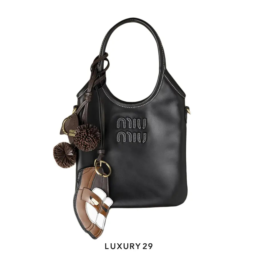 Miu Miu Penny Loafer leather keychain trick cognac Bianco