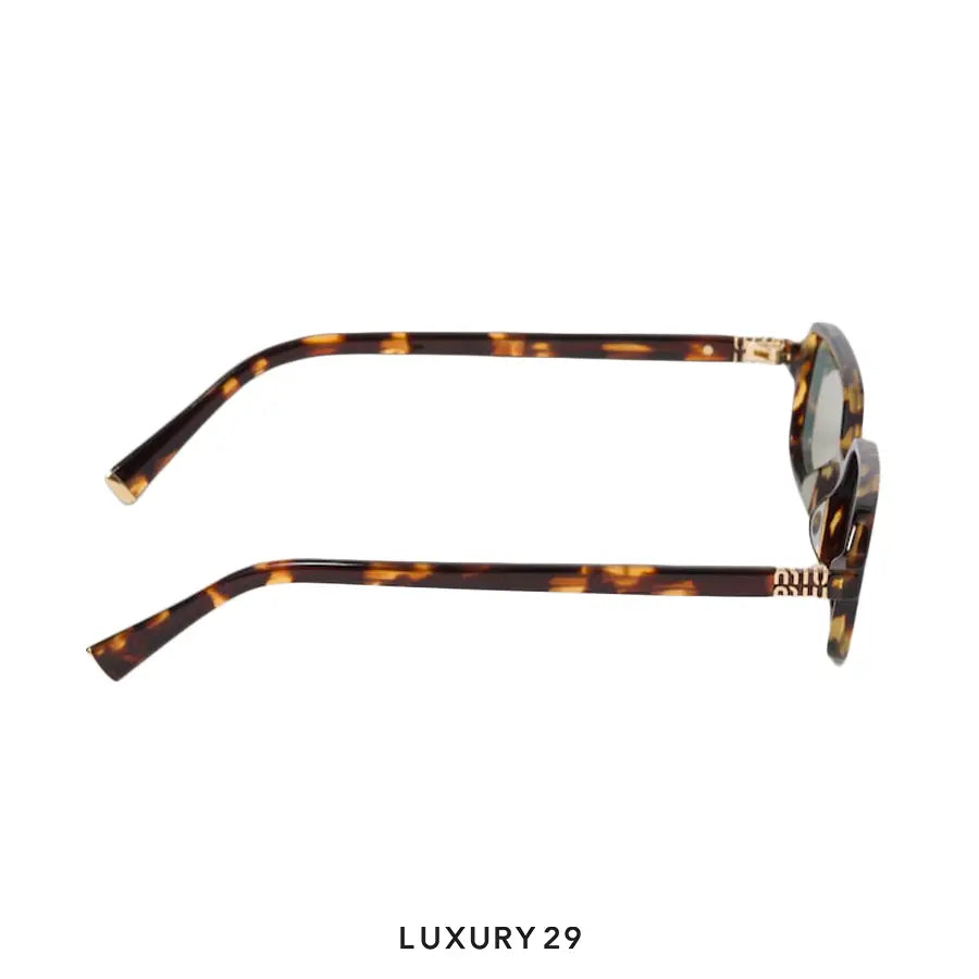Miu Miu Regard Sunglasses Water Green Lenses MIU MIU