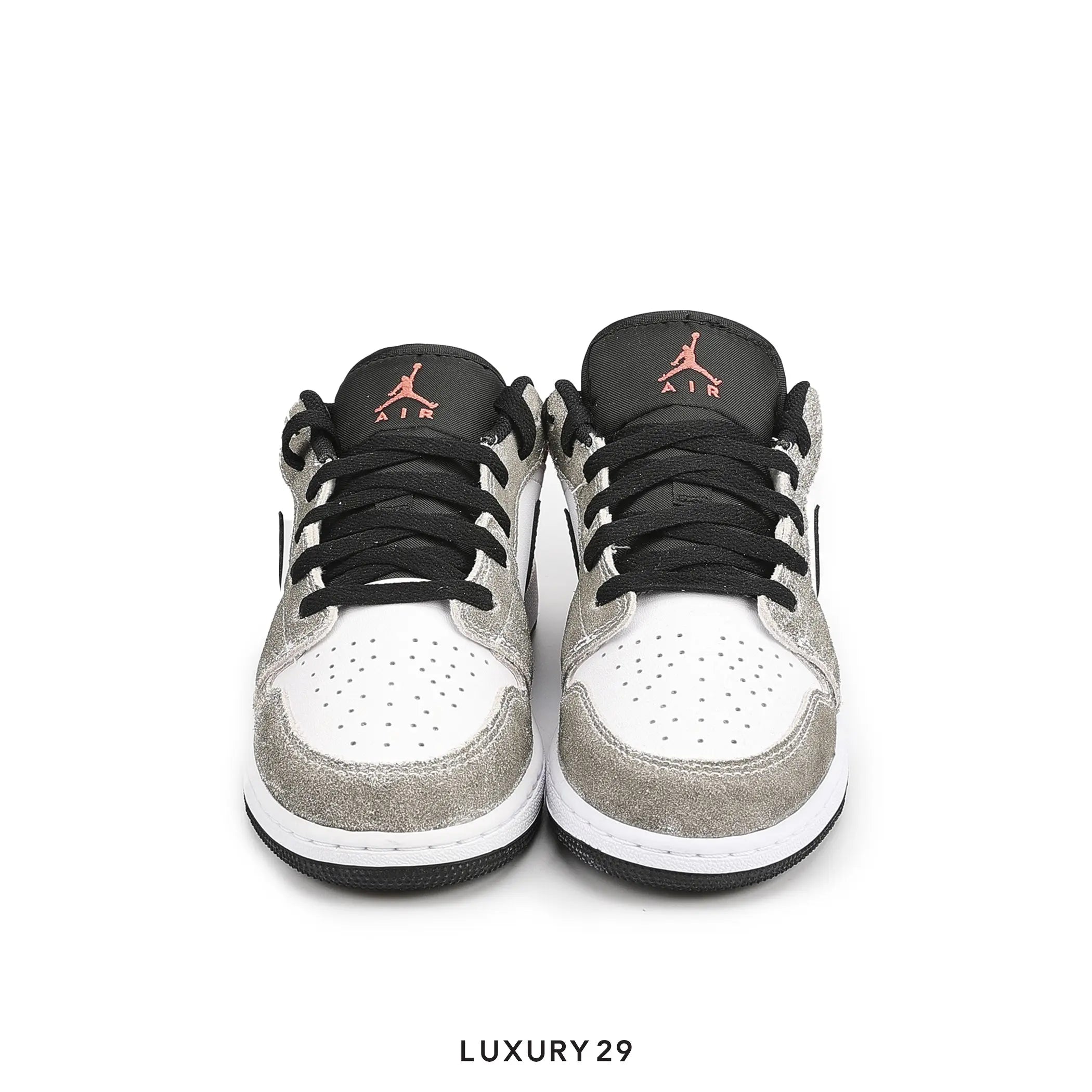 Pair of Jordan sneakers on a white background with 'Luxury 29' branding.