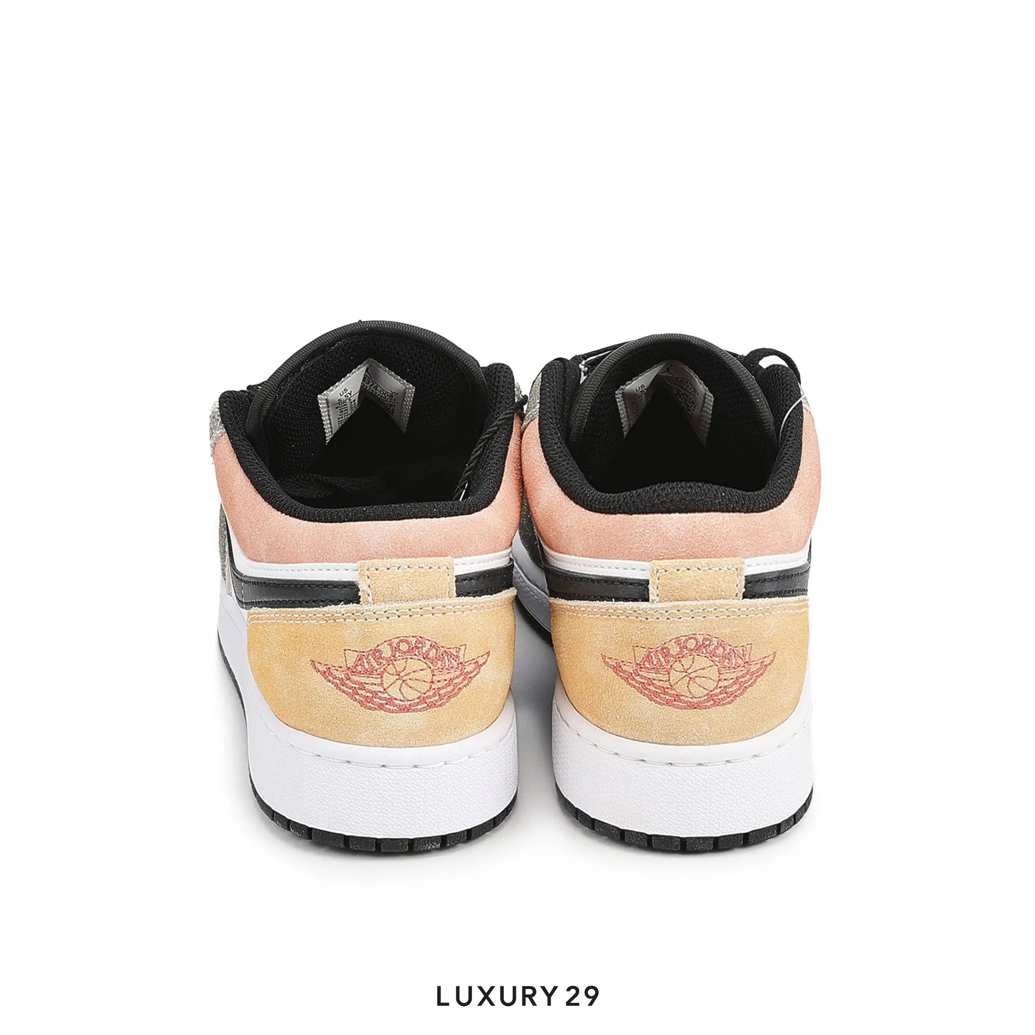 Pair of sneakers with a visible brand logo on a white background