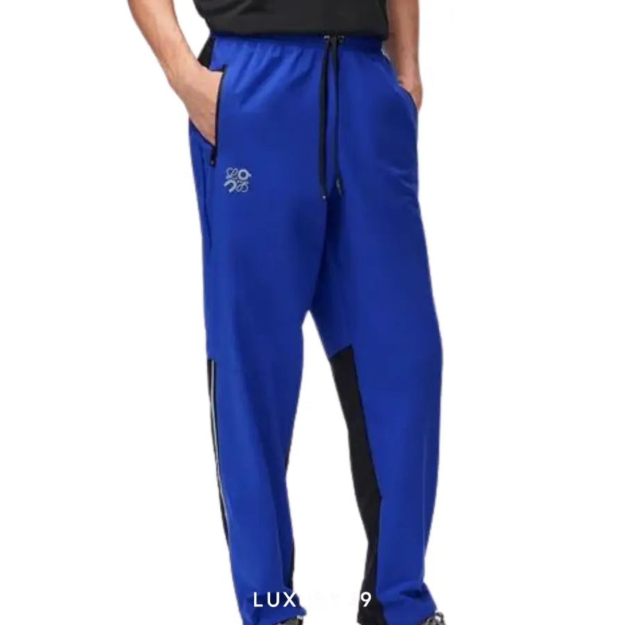 On x Loewe Tracksuit trousers in technical shell Blue ON Luxury29