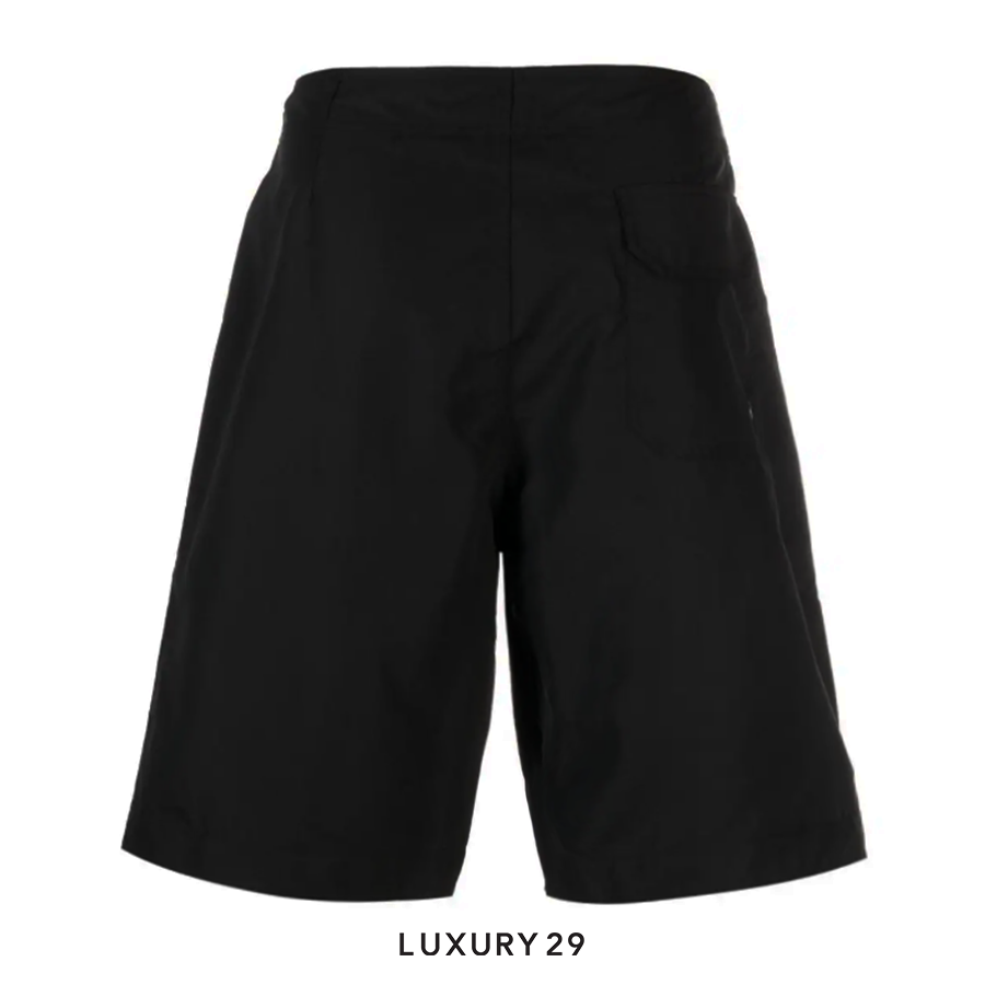 Black shorts on a white background with 'LUXURY 29' text.