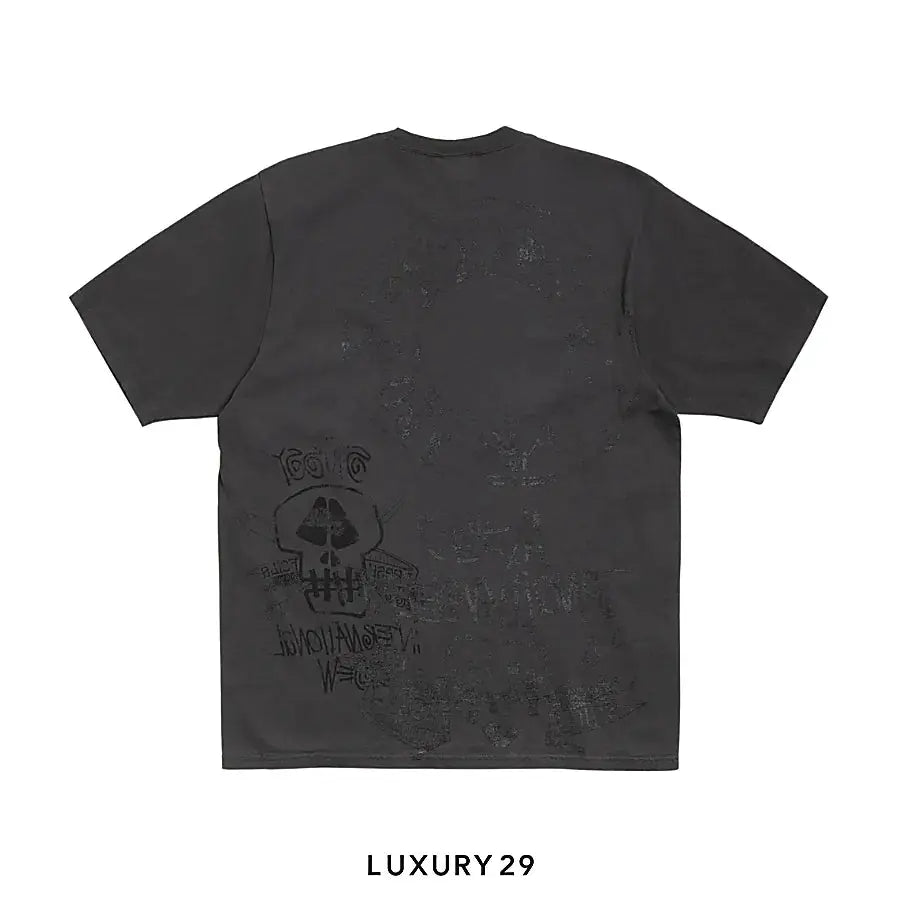 STUSSY SKULLS TEE PIGMENT DYED FADED BLACK