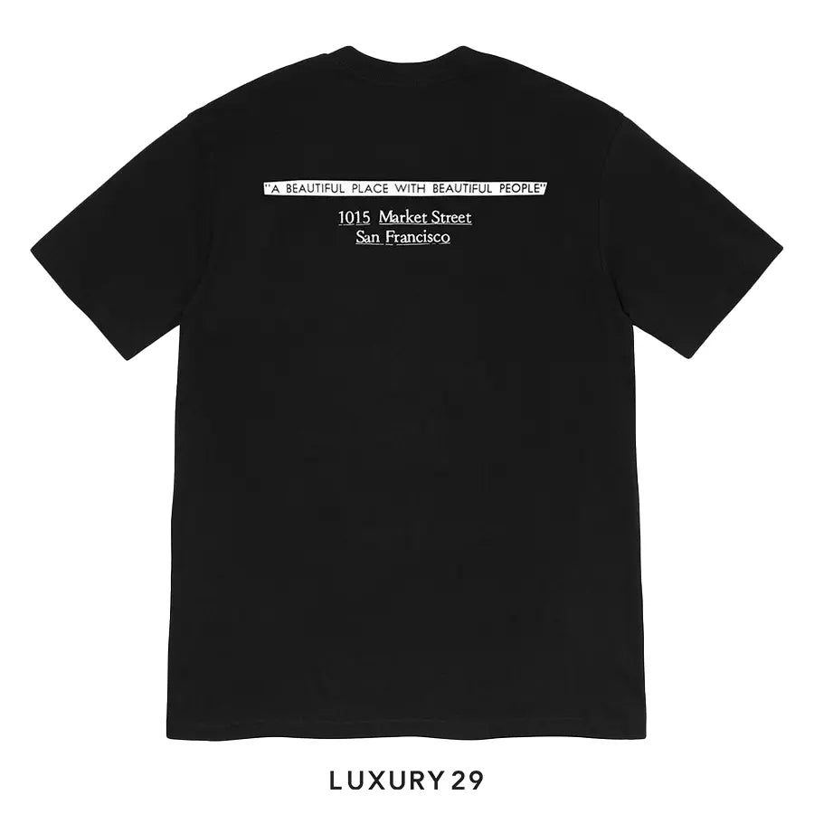 Black t-shirt with white text on a white background