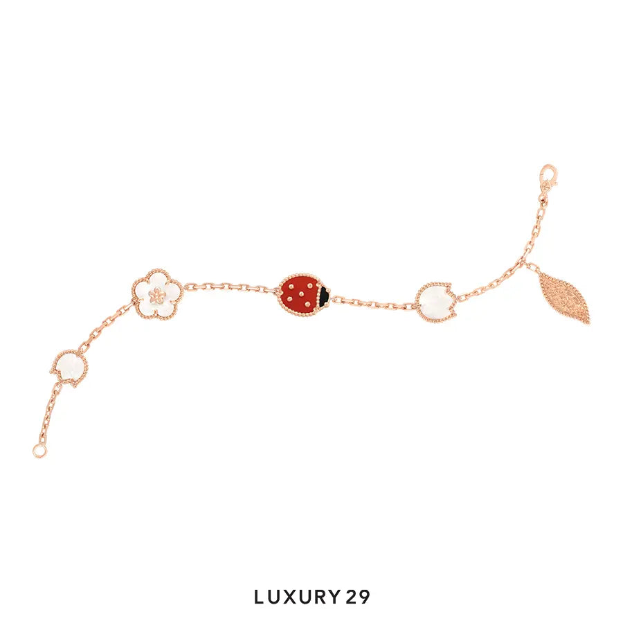 Van Cleef & Arpels Lucky Spring bracelet, 5 motifs 18K rose gold, Carnelian, Mother-of-pearl, Onyx
