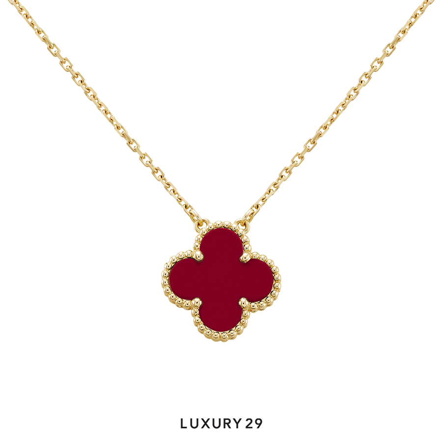 Van Cleef & Arpels Vintage Alhambra pendant, 18K yellow gold, carnelian VAN CLEEF & ARPELS