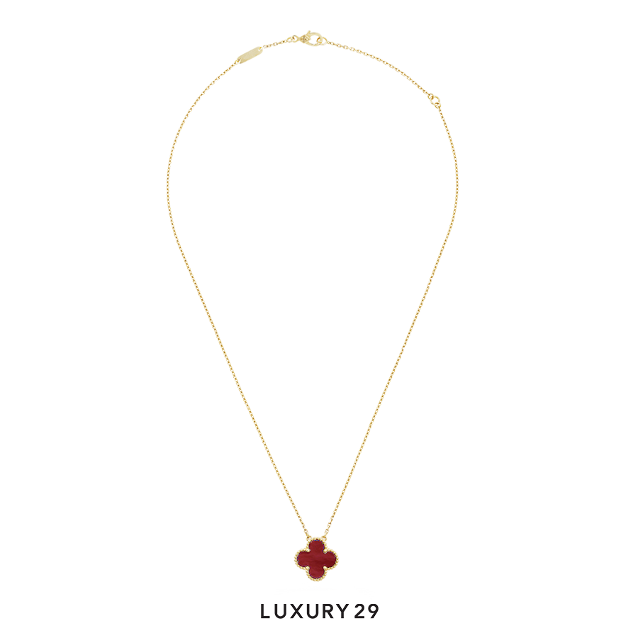 Van Cleef & Arpels Vintage Alhambra pendant, 18K yellow gold, carnelian VAN CLEEF & ARPELS