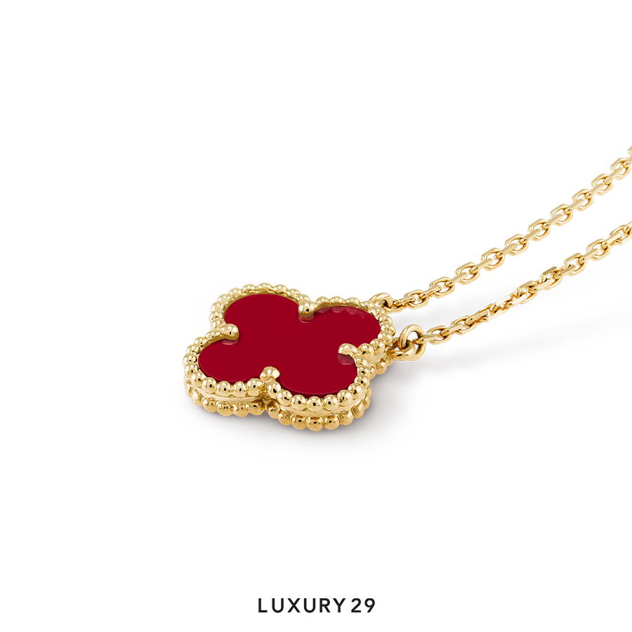 Van Cleef & Arpels Vintage Alhambra pendant, 18K yellow gold, carnelian VAN CLEEF & ARPELS