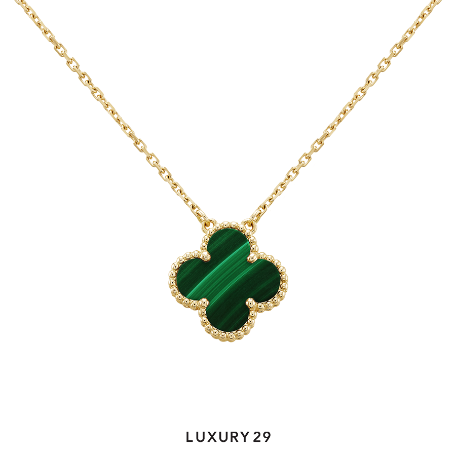 Van Cleef & Arpels Vintage Alhambra pendant, 18K yellow gold, malachite VAN CLEEF & ARPELS