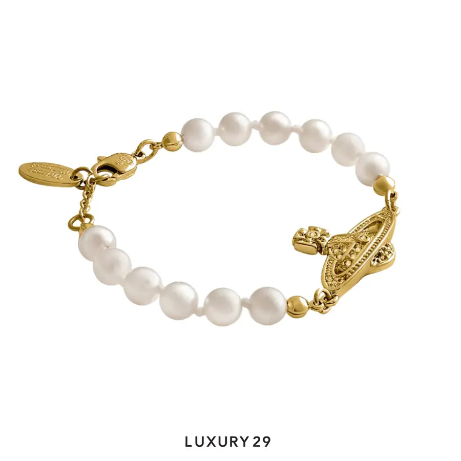 Vivienne Westwood Mini Bas Relief Bracelet Gold Light Colorado Topaz Pearl