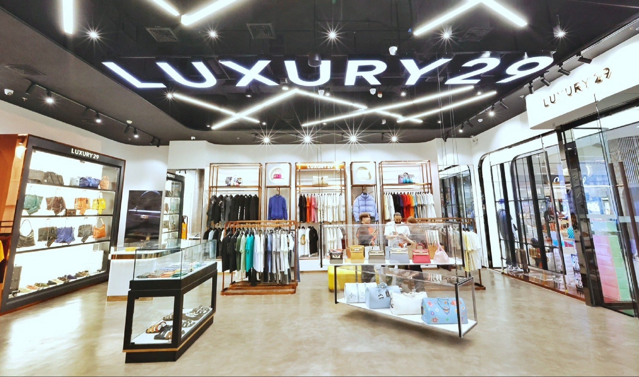 Luxury store interior with 'LUXURY29' branding on the ceiling.